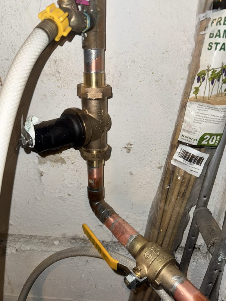 New copper repipe with backflow preventer and shutoff valves